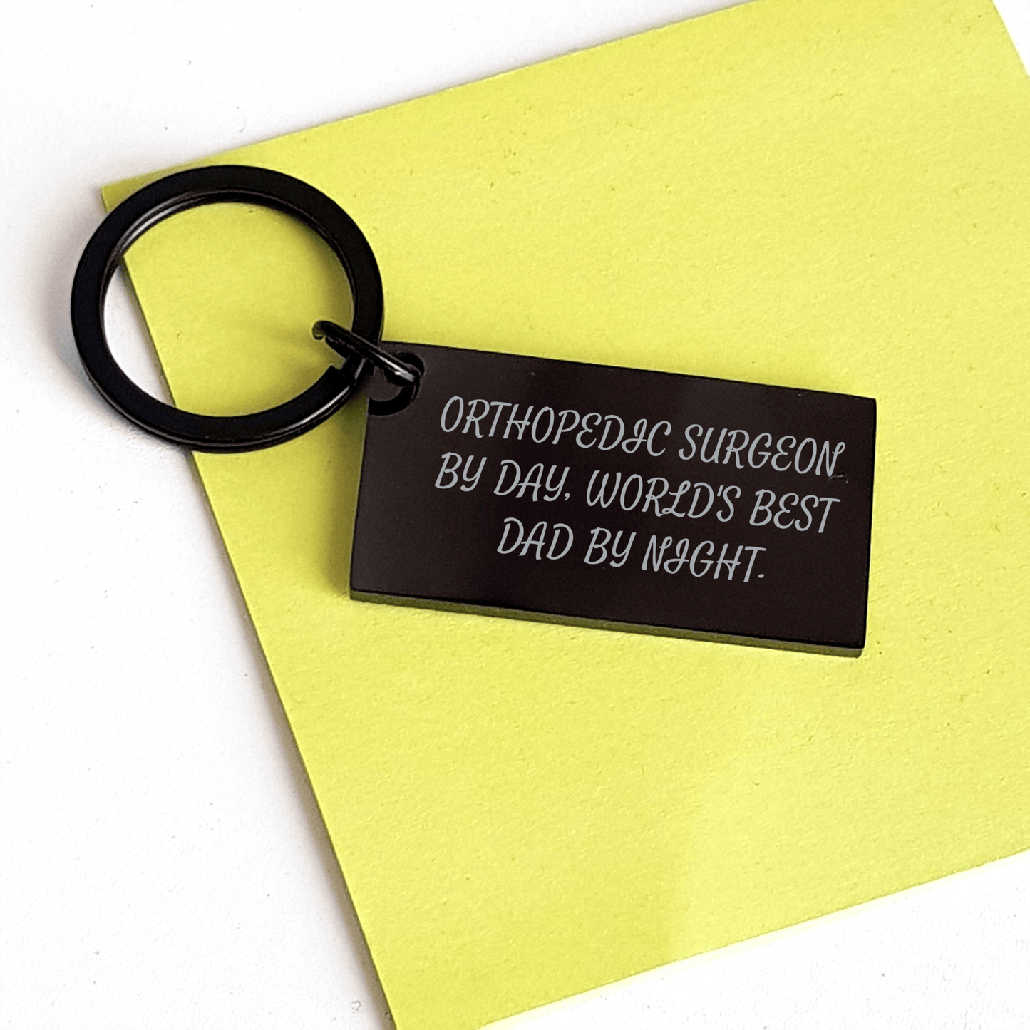 Orthopedic Surgeon Gifts, Funny Keychain for Father's Day, 'Orthopedic Surgeon By Day, World's Best Dad By Night.' Engraved Stainless Steel Keychain from Friends small / Black