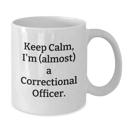 Funny Correctional Officer Gifts, White Coffee Mug, 'Keep Calm, I'm (almost) A Correctional Officer.' - Additional