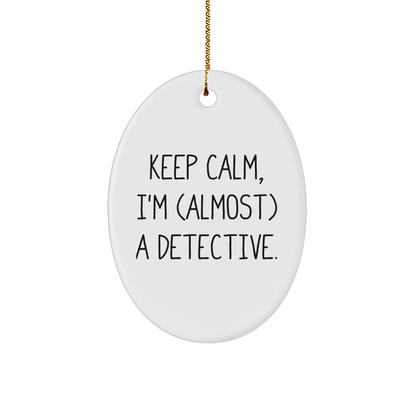 Detective Gifts for Fans - Keep Calm, I'm (almost) A Detective. Oval Ornament, White, 3.25" tall, Christmas Unique Gifts from Friends to Family - Image 1