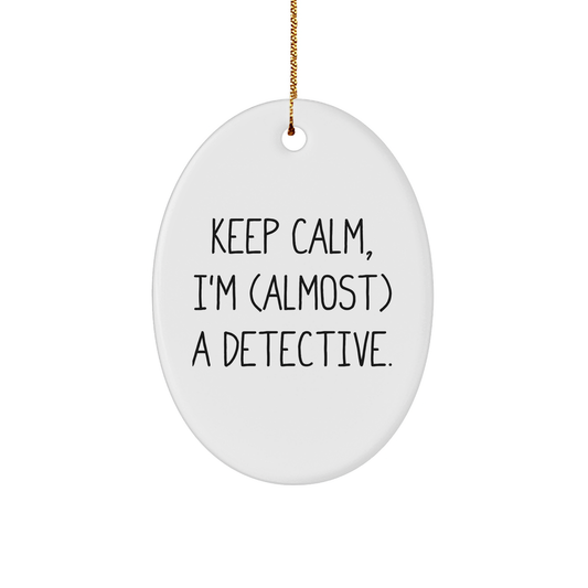 Detective Gifts for Fans - Keep Calm, I'm (almost) A Detective. Oval Ornament, White, 3.25" tall, Christmas Unique Gifts from Friends to Family - Image 1