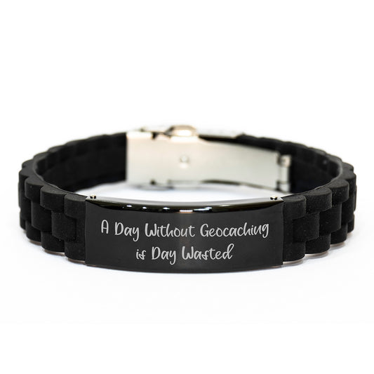 Funny Geocaching Gifts from Friends for Birthday Lovers - 'A Day Without Geocaching Is Day Wasted' Glide lock Clasp Bracelet - Image 1