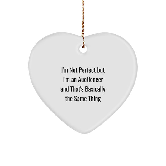 Funny Auctioneer Gifts from Friends to Family, Heart Ornament for Christmas, 'I'm Not Perfect But I'm An Auctioneer' Quote - Image 1