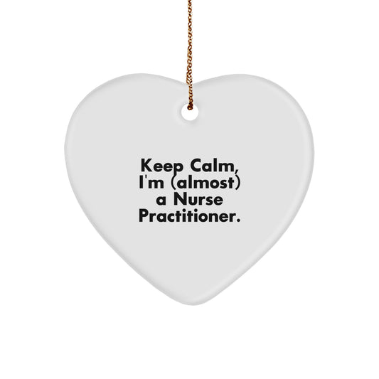 Funny Nurse Practitioner Gifts from Friends, 'Keep Calm I'm (almost) A Nurse Practitioner', Heart Ornament for Christmas - Image 1