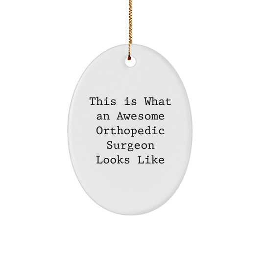 Orthopedic Surgeon Gifts, Funny Oval Ornament, 'This Is What An Awesome Orthopedic Surgeon Looks Like', Christmas Unique Gifts from Friends to Orthopedic Surgeon - Image 1