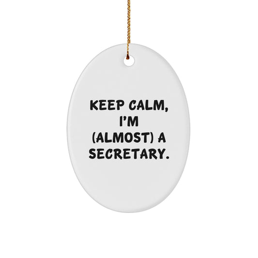 Funny Secretary Gifts, Keep Calm, I'm (almost) A Secretary. Oval Ornament Gifts from Family to Friends, Coworkers, and More - Image 1